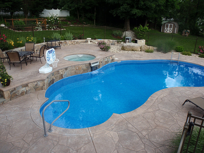 Swimming pool and stamped concrete project example 42